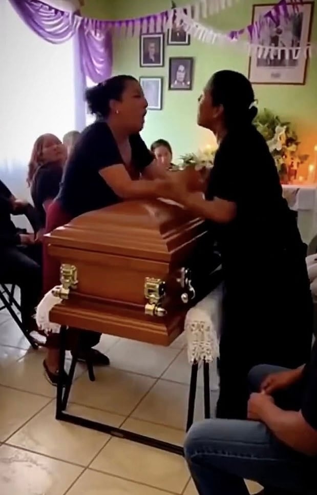 Women brawl on top of dead man’s coffin at his funeral after realising he was dating both of them