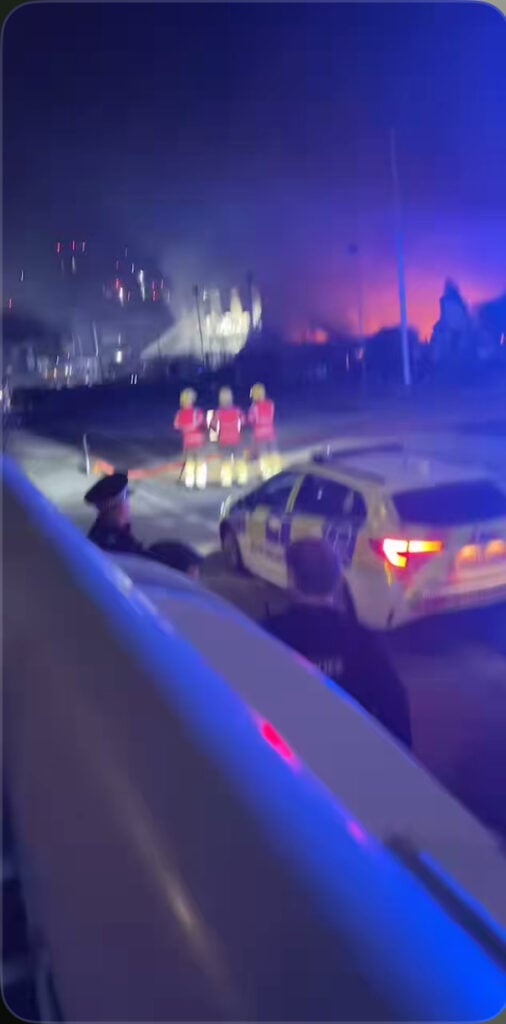 Major Fire Breaks Out in Salford as Firefighters Battle Blaze and Thick Smoke